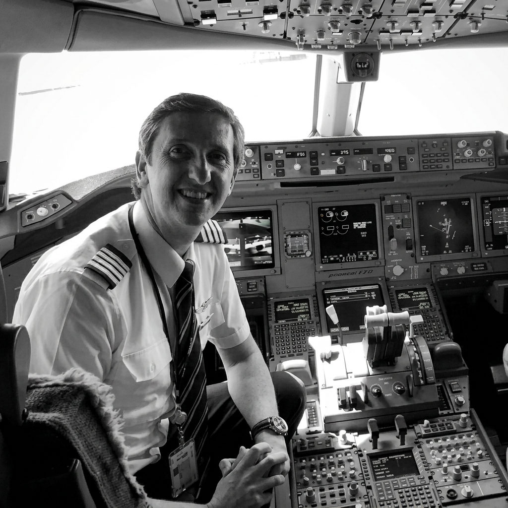 Captain John Corri in the flight deck of a Boeing 777